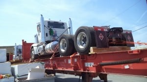 semi truck on a flat rack container