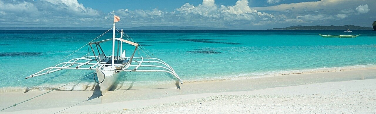 Moving to the Philippines Boat on Beach Ocean Landscape