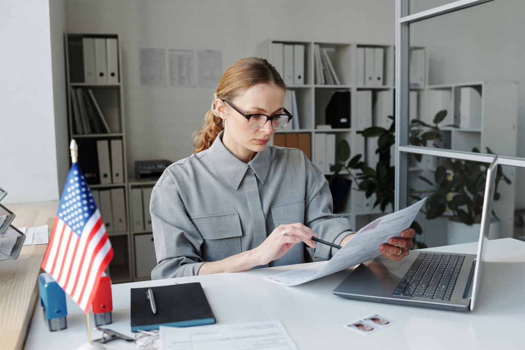 Woman working with visa applications